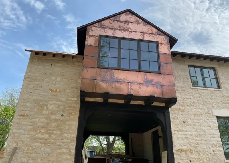 Copper metal panel facade on a stone building for Metal Roof Coating in Tega Cay